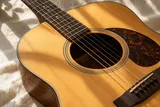 An acoustic guitar (AI-generated concept image)