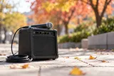 An amplifier and microphone outdoors (AI-generated concept image)